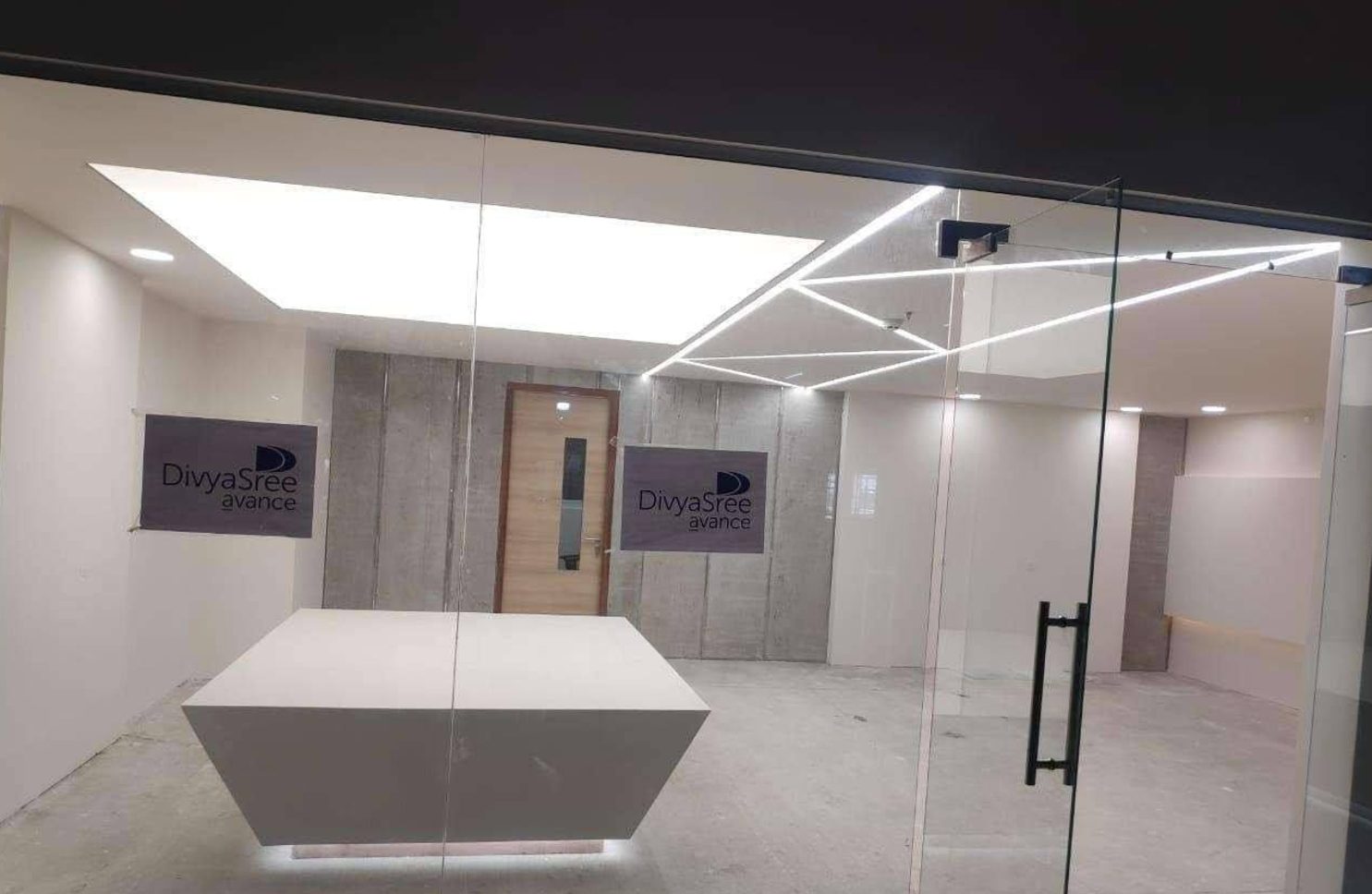 Office reception with linear lighting