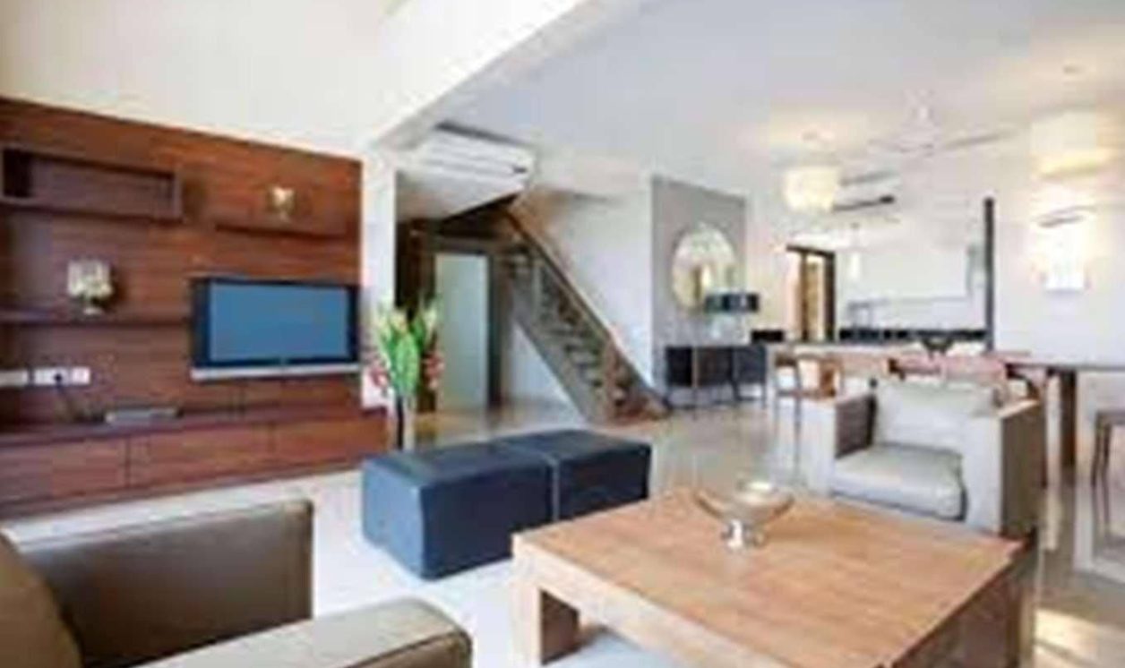 Duplex living room with timber media wall